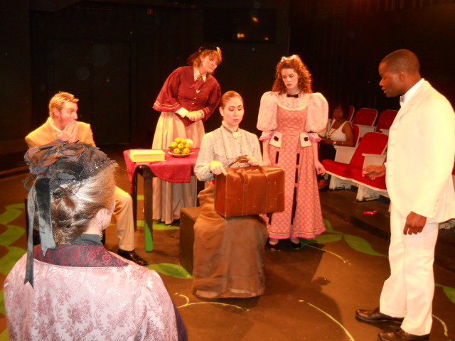 New Jersey Youth Theatre Alumni Eryn LeCroy  in the handbag discovery scene from Turning Leaf Theater Company's 2010 production of THE IMPORTANCE OF BEING EARNEST.